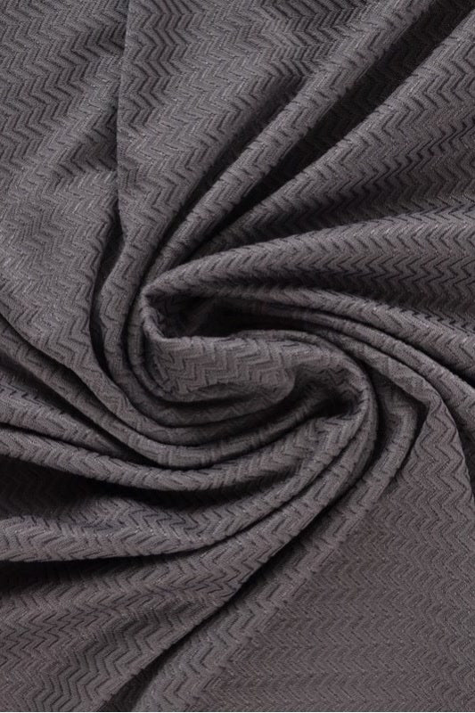 Mörkgrå polyamid-elastanjersey med sillbensmönster, draperat (bild 1 av 7)