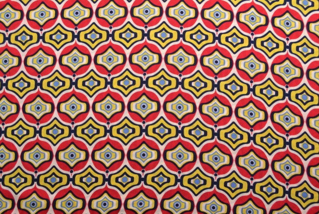 Viscosetyg med rött och gult geometriskt båg tryck (bild 2 av 5)