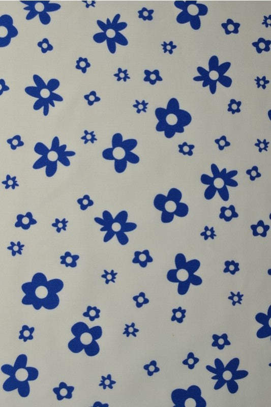 Creme bomuldspoplin med blomsterprint – marineblå, metervare til erhverv (billede 1 af 3)