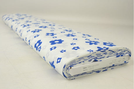 Creme bomuldspoplin med blomsterprint – marineblå, metervare til erhverv (billede 2 af 3)