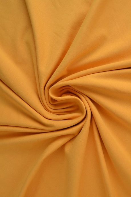 Currygul bomullsjersey – naturlig, andningsbar & stretchig (bild 1 av 8)