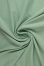 Vintagegrön french terry – mjuk bomullsstickad metervara med stretch (bild 1 av 5)