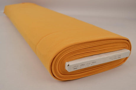 Okergul french terry – mjuk bomullsstickad metervara med stretch (bild 2 av 5)