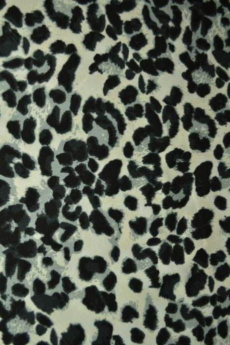 Beige bomullspoplin med leopardryck – brun & svart (bild 1 av 2)