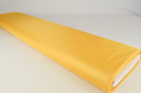 Mörkgul charmeuse foder med stretch (bild 2 av 2)