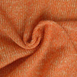Orange jersey med lurex – elastiskt glittertyg (bild 1 av 2)