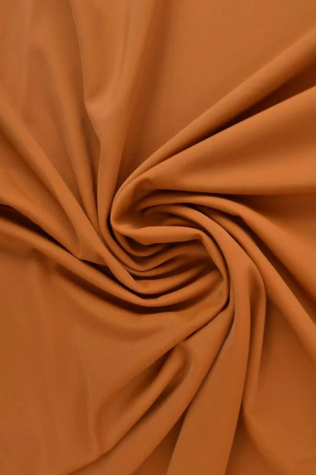 Mörk karrygul lycra – 4-vägs stretch & snabbtorkande (bild 1 av 7)