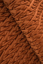 Djup rostorange magic deluxe p300 – quiltad velour med flätmönster (bild 1 av 5)
