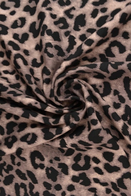 Beige & cognac viscosetyg med leopardtryck (bild 1 av 9)